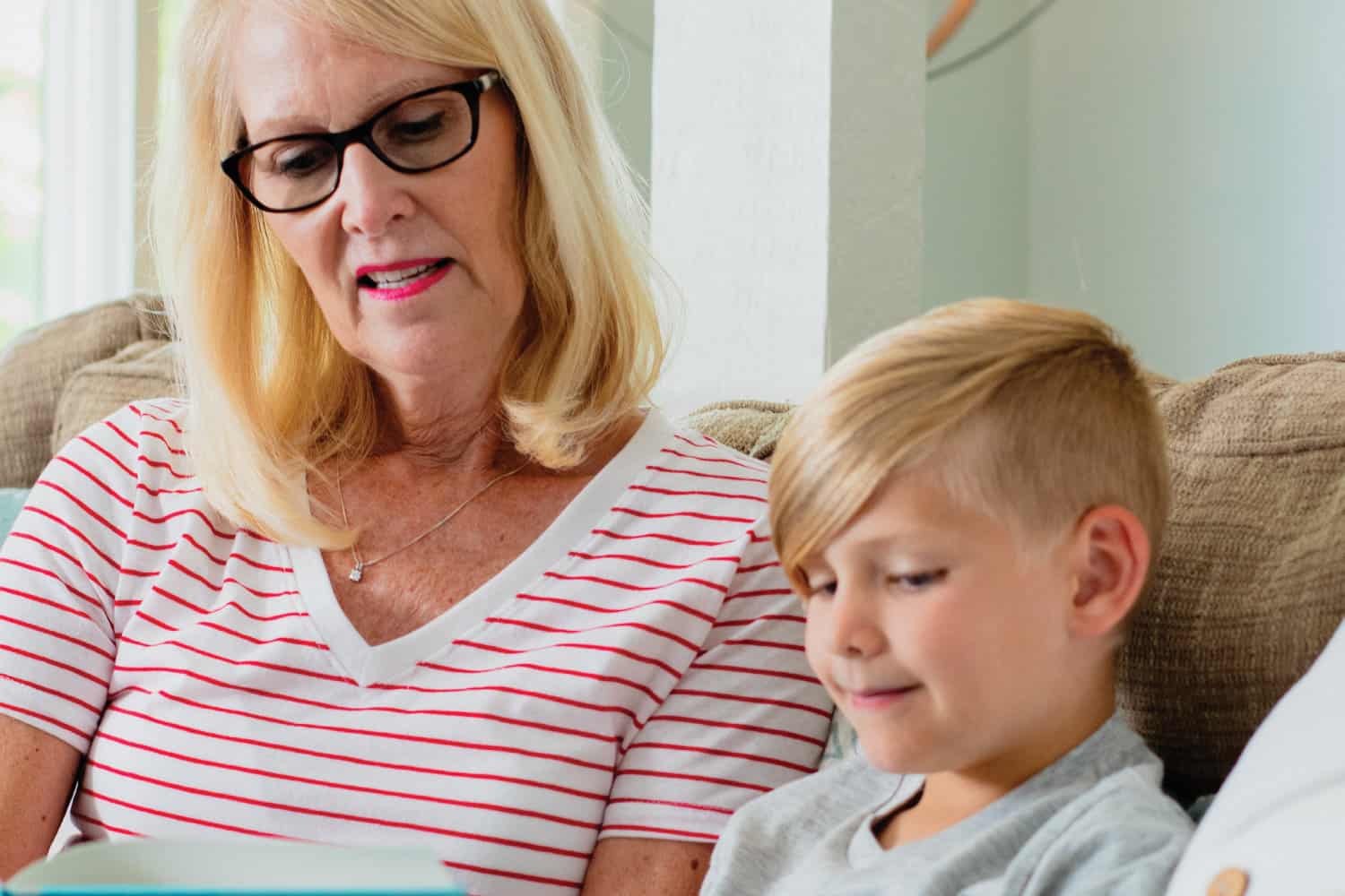 Grandma reading book to grandson