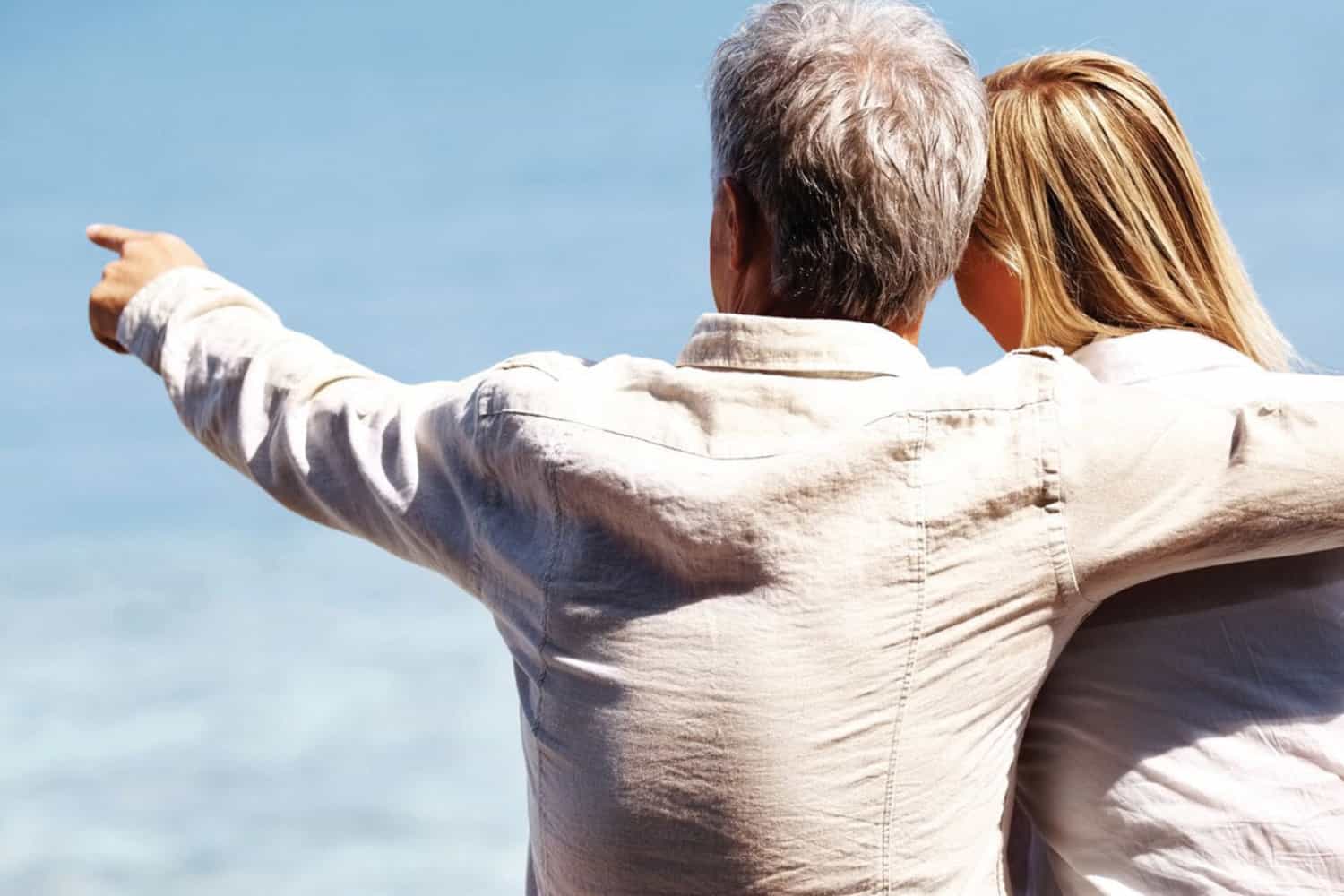 Happy couple by the ocean