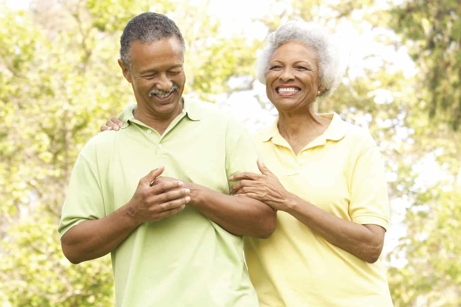 Happy couple walking in a park