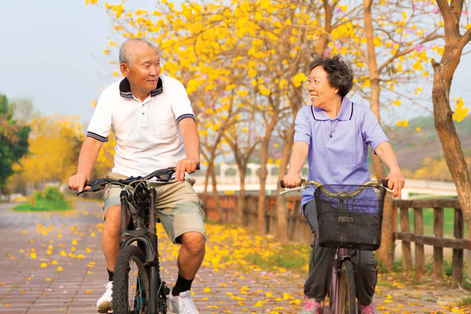 Happy couple riding bikes