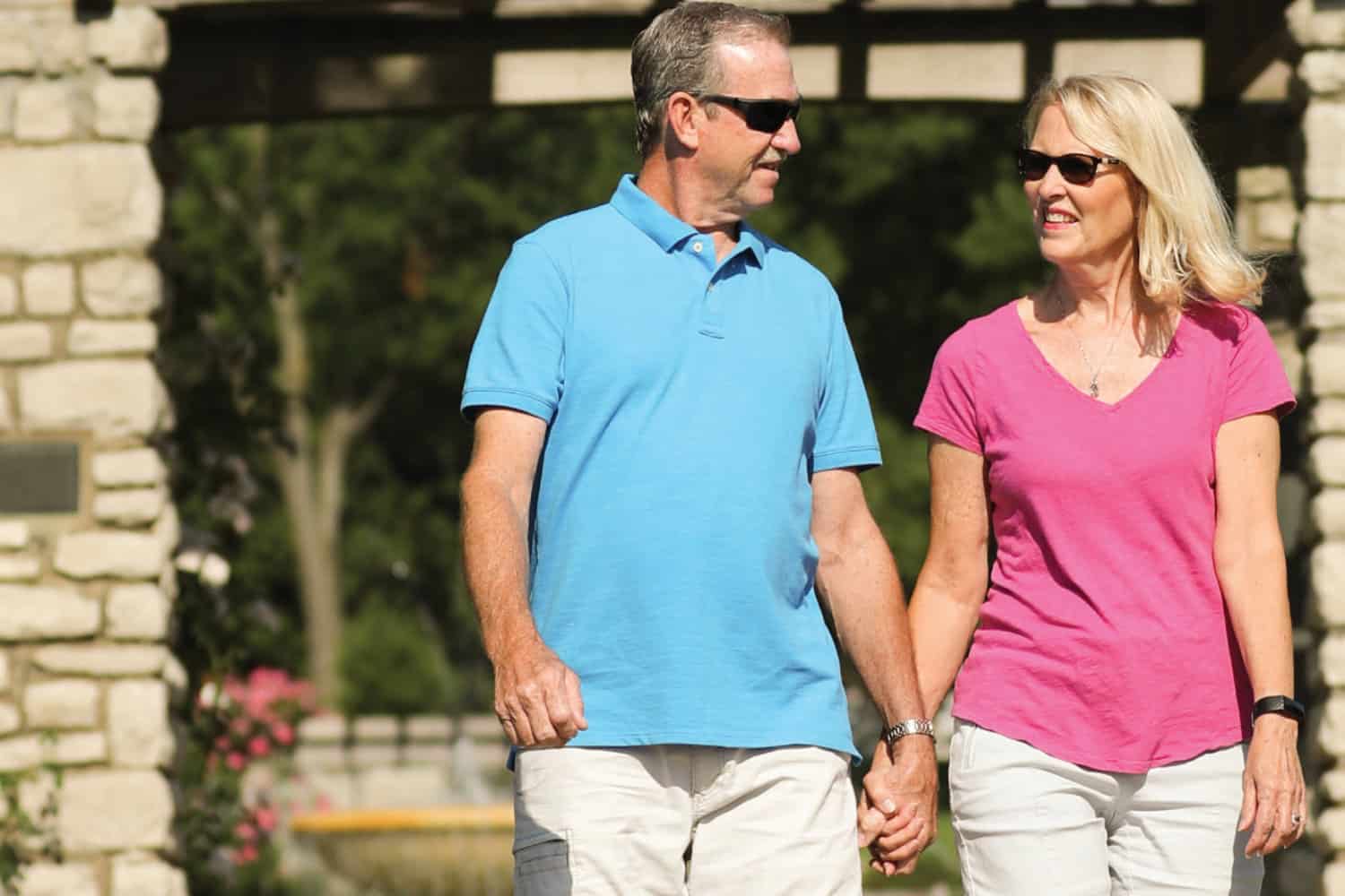 Happy couple holding hands