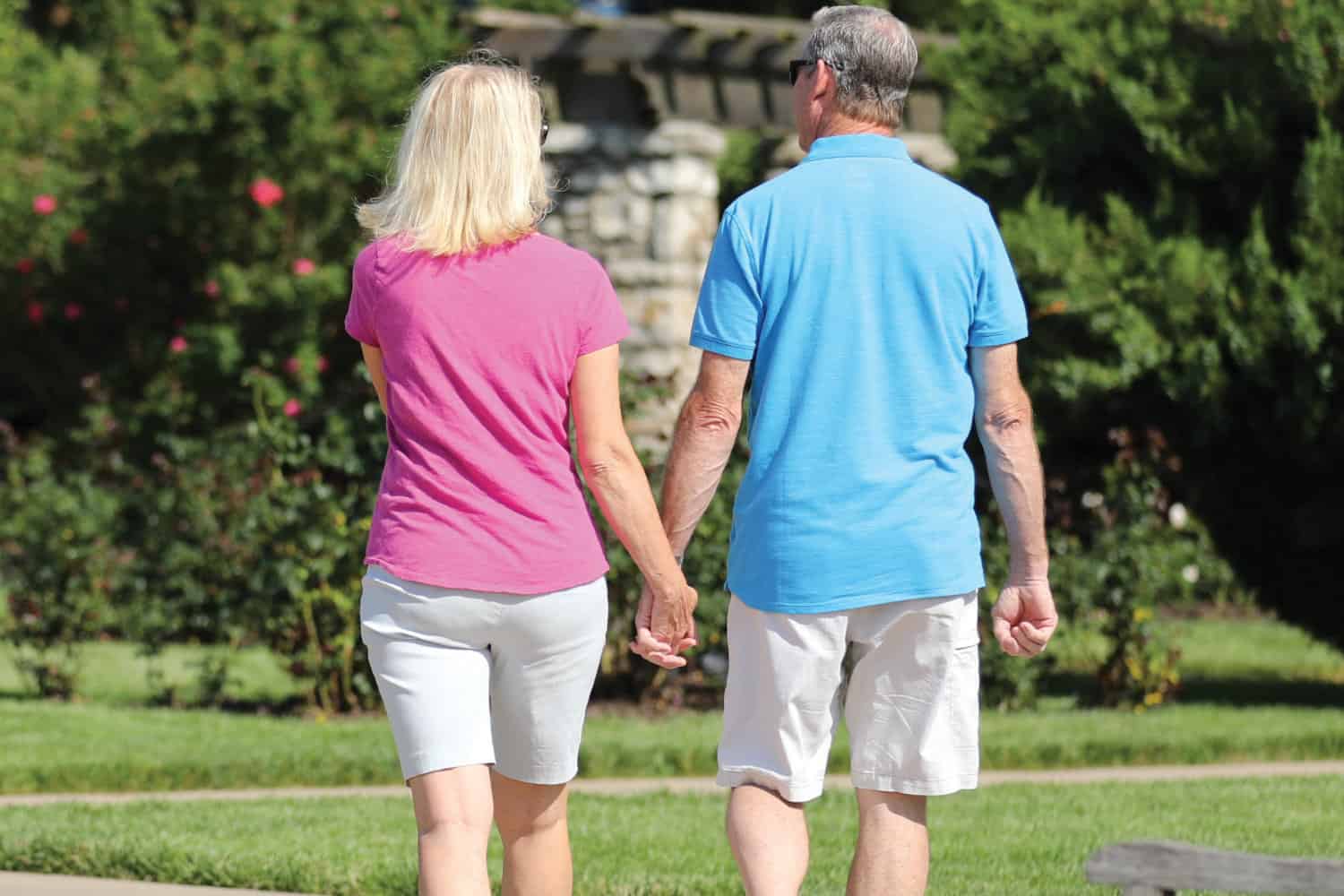 Happy couple holding hands