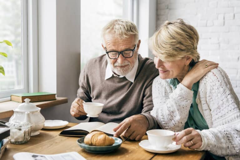 Retired couple having breakfast