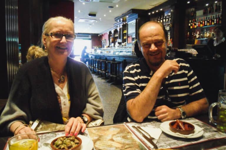 Retired couple enjoying dinner appetizers
