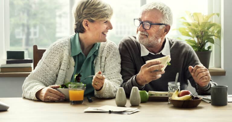 Retired couple having lunch together